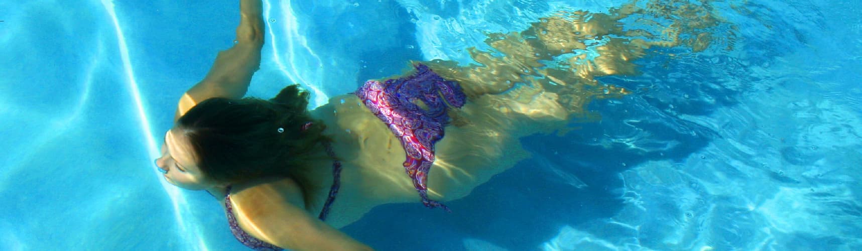 Woman Swimming In Heated Pool - Alto Pacific Pty Ltd